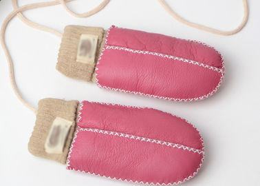 China Warmest Hand Sewn Baby Sheepskin Mittens With Light Pink Cuff supplier